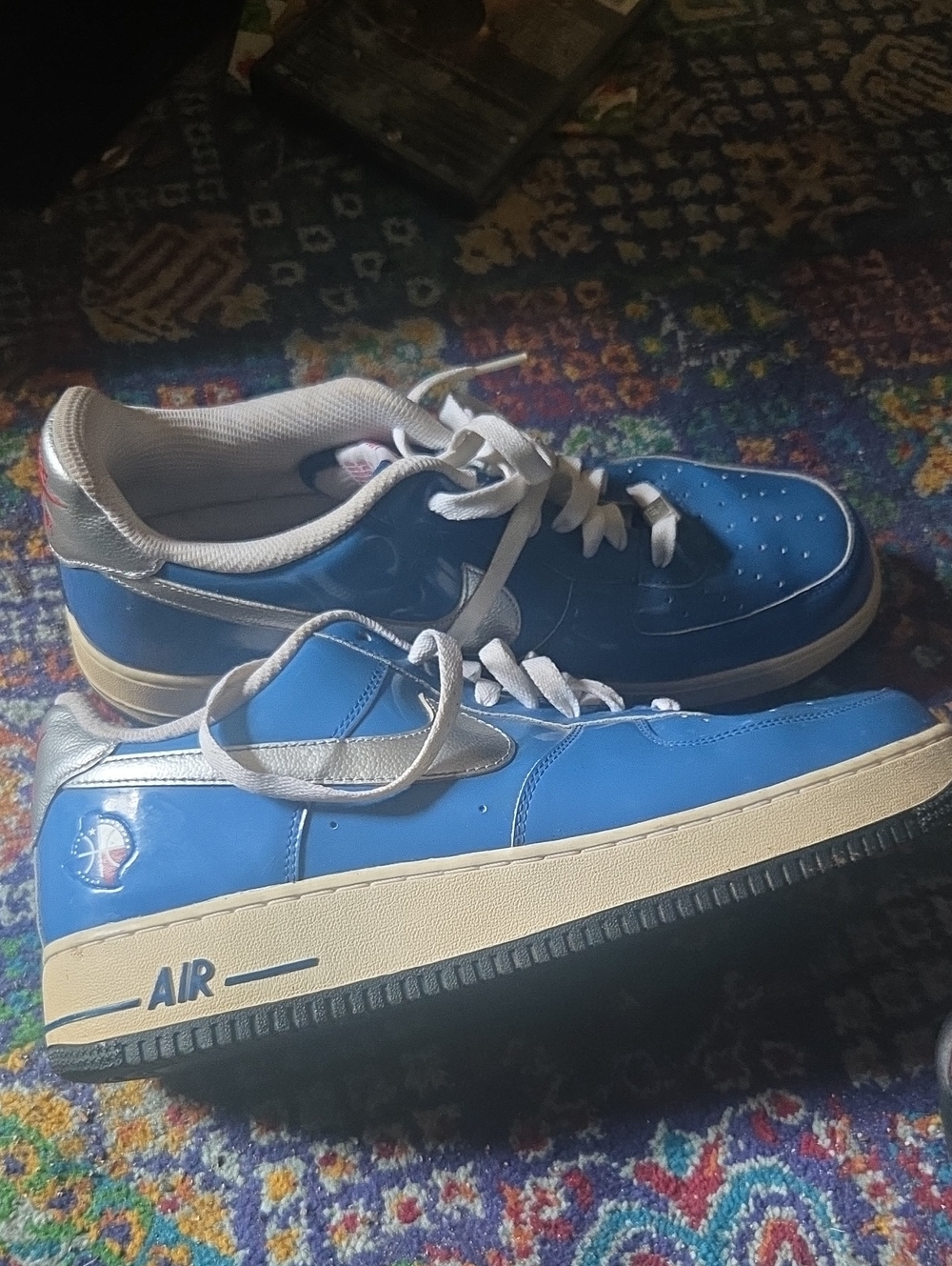 Blue Low-Top Sneakers with Silver Swoosh
